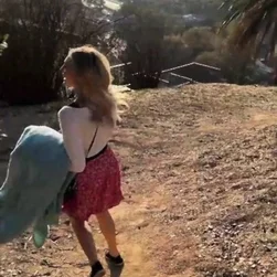 Blonde Exhibitionist Flashes Her Skirt in Public While Hiking Outdoors