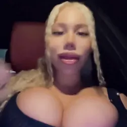 Busty Blonde’s Seductive Tease